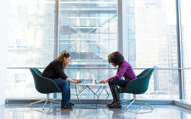 Two people working together